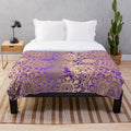 Plush purple and gold mandala pattern blanket
