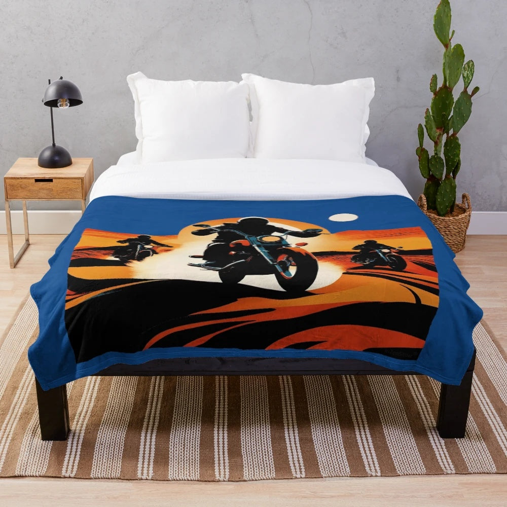 Plush blanket with motorcycle and desert-inspired design
