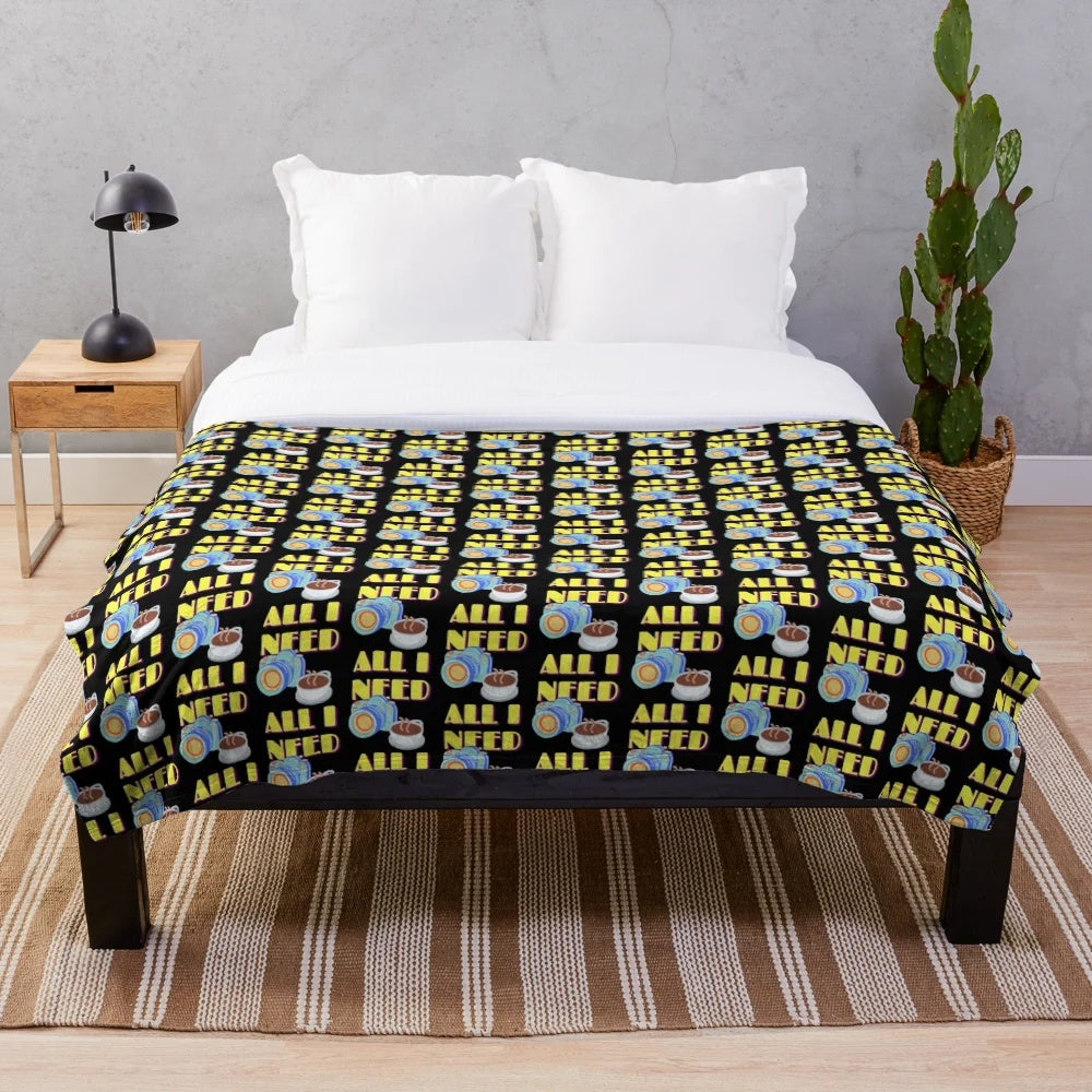 Pop art style plush blanket featuring camera and coffee design