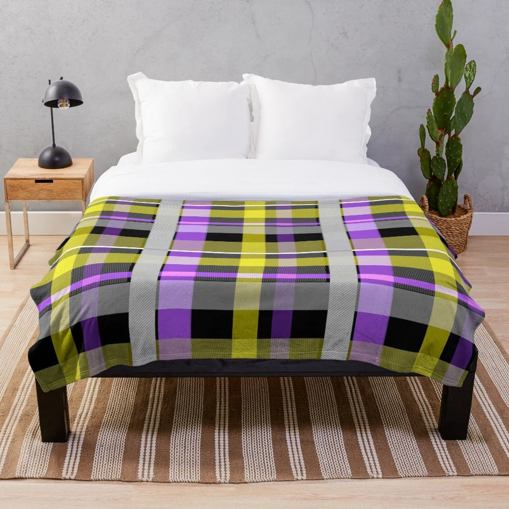 Plush blanket featuring the nonbinary pride flag colors