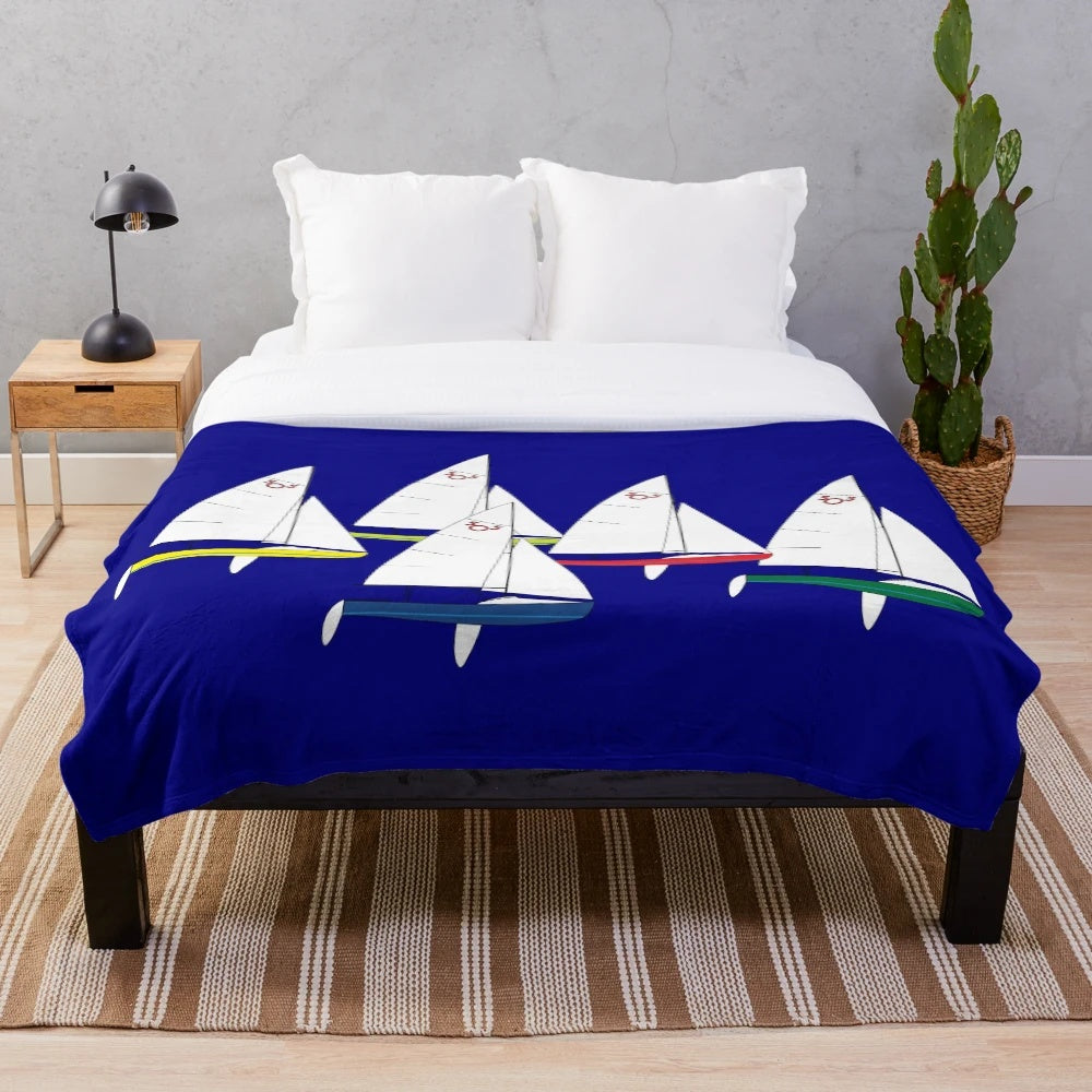 Soft and cozy plush blanket with sailboat racing design