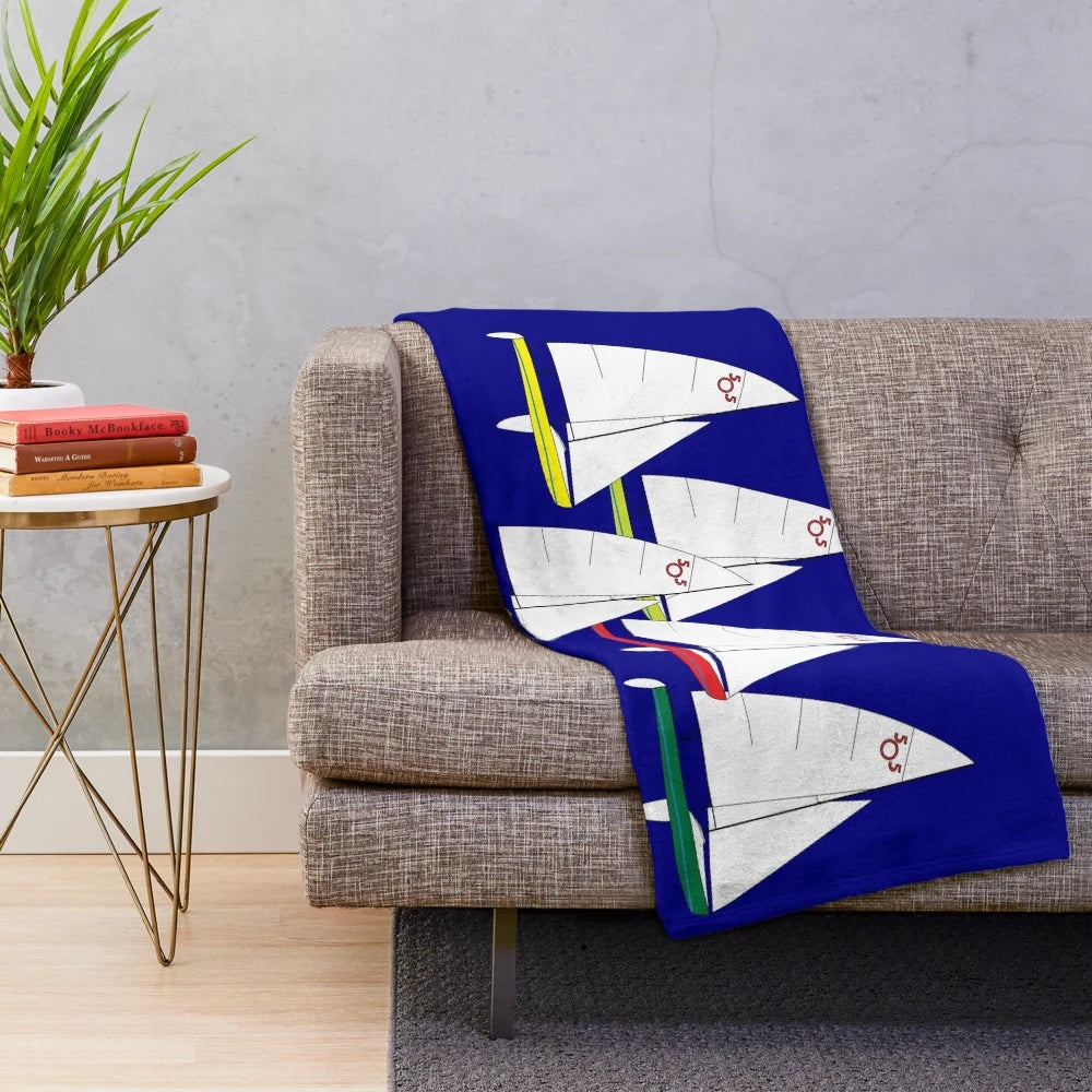 Soft and cozy plush blanket with sailboat racing design
