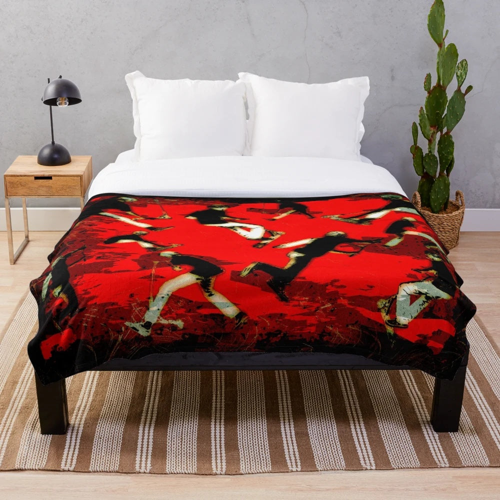 Plush blanket featuring scooter stunt graphics