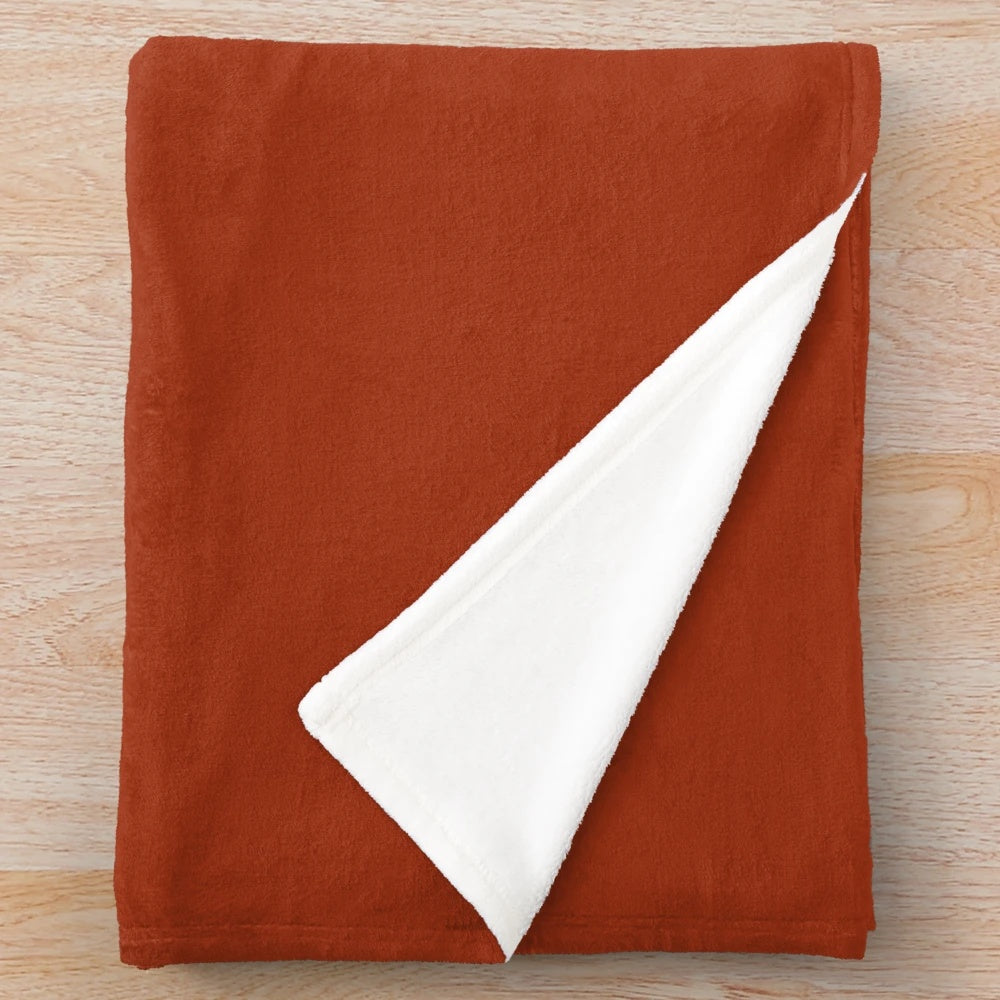 Plush burnt orange solid color blanket for cozy seasonal decor
