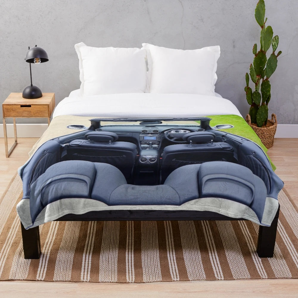 Soft and cozy plush blanket featuring a sports car design