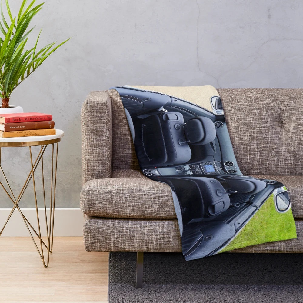 Soft and cozy plush blanket featuring a sports car design