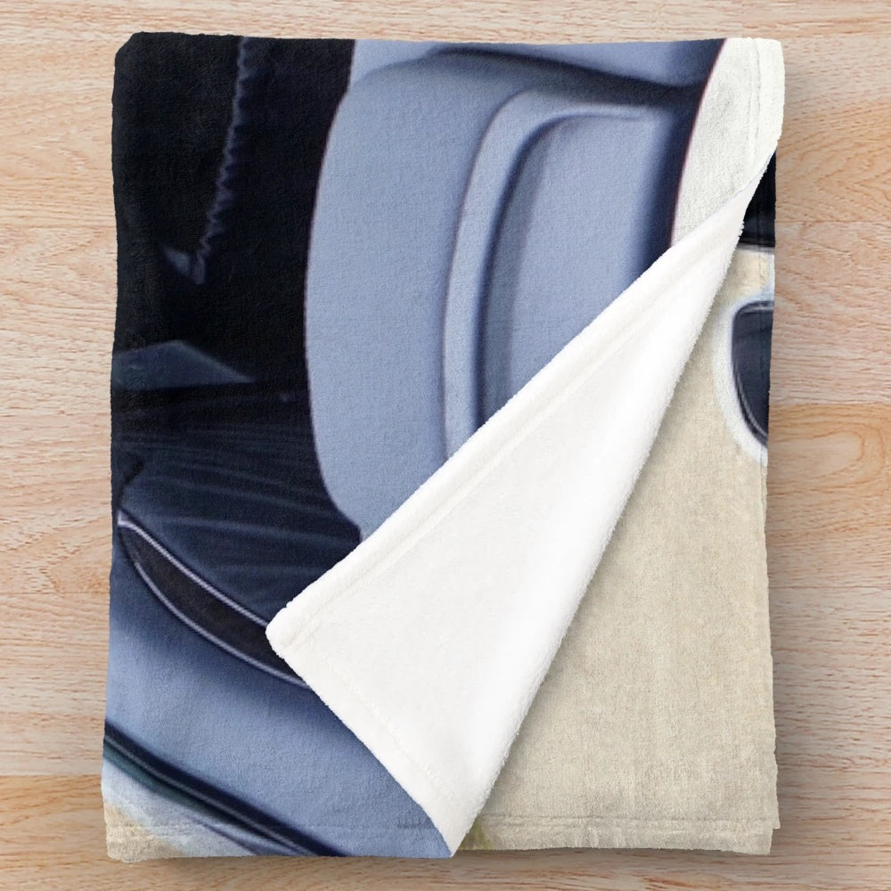 Soft and cozy plush blanket featuring a sports car design