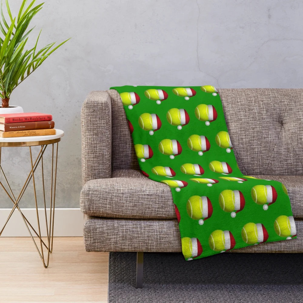 Soft and cozy plush tennis ball-themed Christmas blanket for sports fans