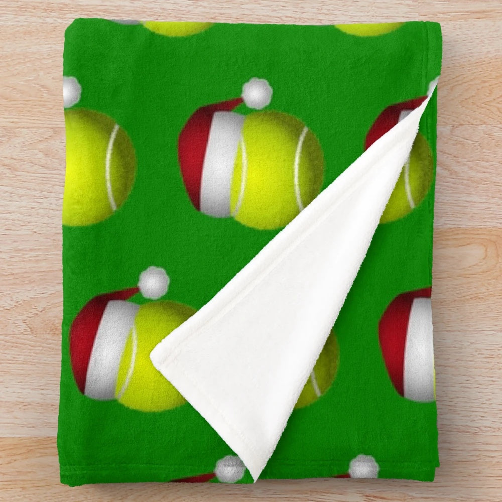 Soft and cozy plush tennis ball-themed Christmas blanket for sports fans