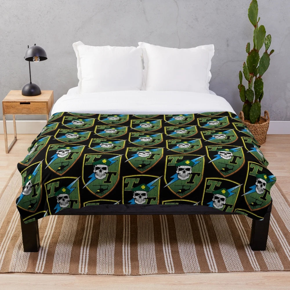 Plush blanket with Tropic Thunder inspired skull design