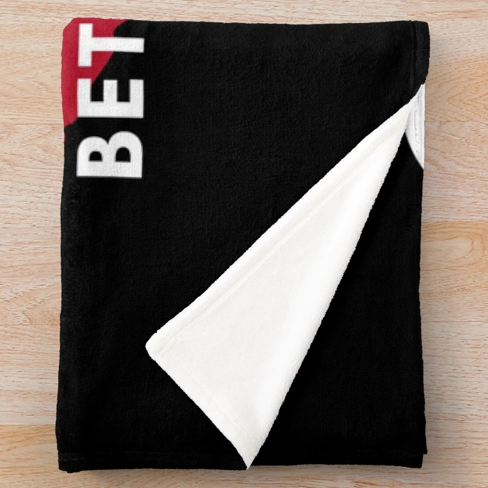 Cozy plush blanket with "Wine makes everything better" design for wine enthusiasts