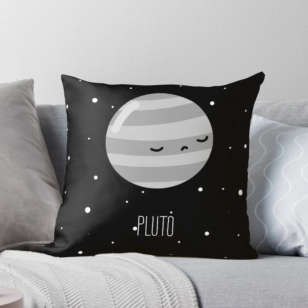 A soft, plush Pluto-themed pillow with a cute, kawaii design for space-inspired home decor.