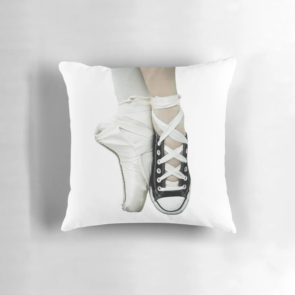 Soft pillow featuring a pointe shoe and Converse sneaker design, perfect for ballet and dance enthusiasts.