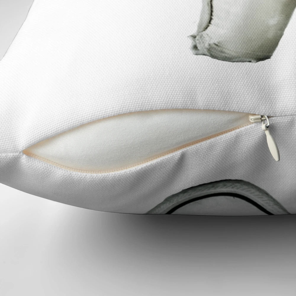 Soft pillow featuring a pointe shoe and Converse sneaker design, perfect for ballet and dance enthusiasts.