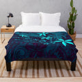 Polynesian-inspired tropical abstract plush blanket with hibiscus floral and tapa cloth patterns