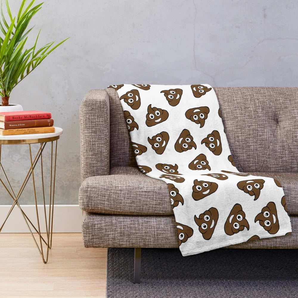 Poop emoji plush blanket with brown poop design