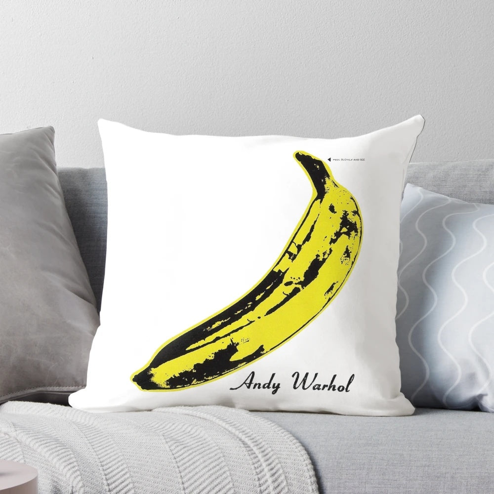 A vibrant pop art inspired pillow cover featuring Andy Warhol's iconic banana design from The Velvet Underground album cover.