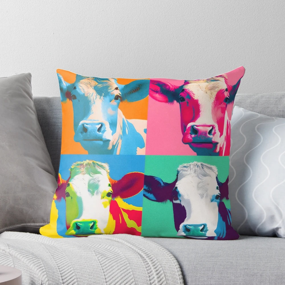 Vibrant pop art screen print collage of a cow in the style of Andy Warhol, printed on a soft, plush pillow.