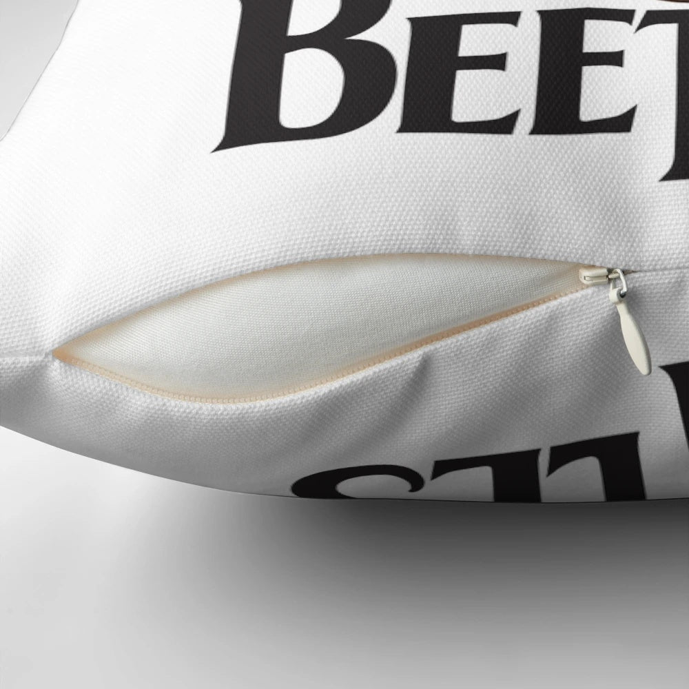 A colorful and whimsical pillow featuring a beetle design, inspired by pop culture references.