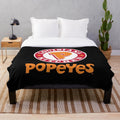 Popeyes logo plush blanket, offering a cozy and comfortable way to showcase your love for the popular fast-food brand.