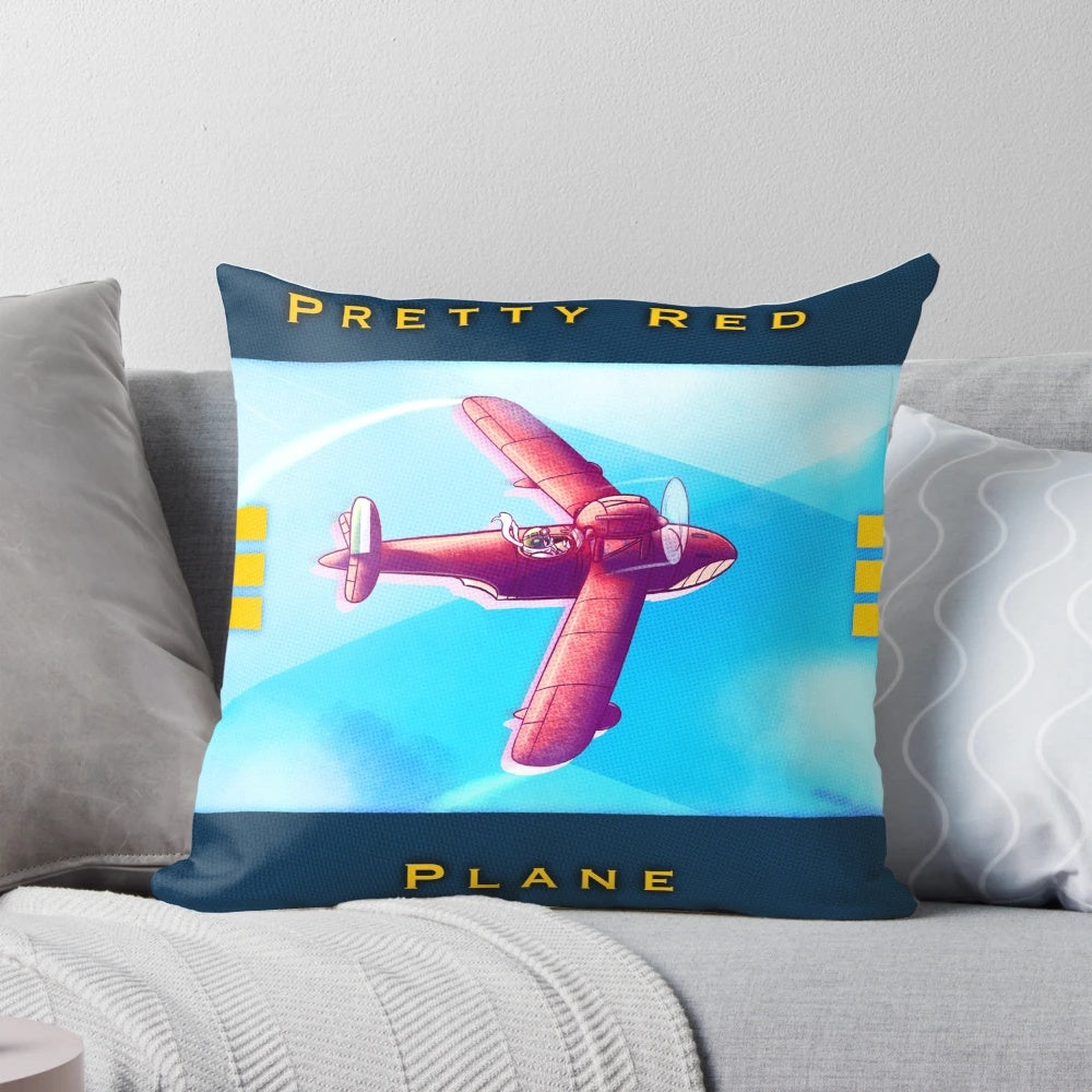 A red plane-themed pillow inspired by the Studio Ghibli film Porco Rosso