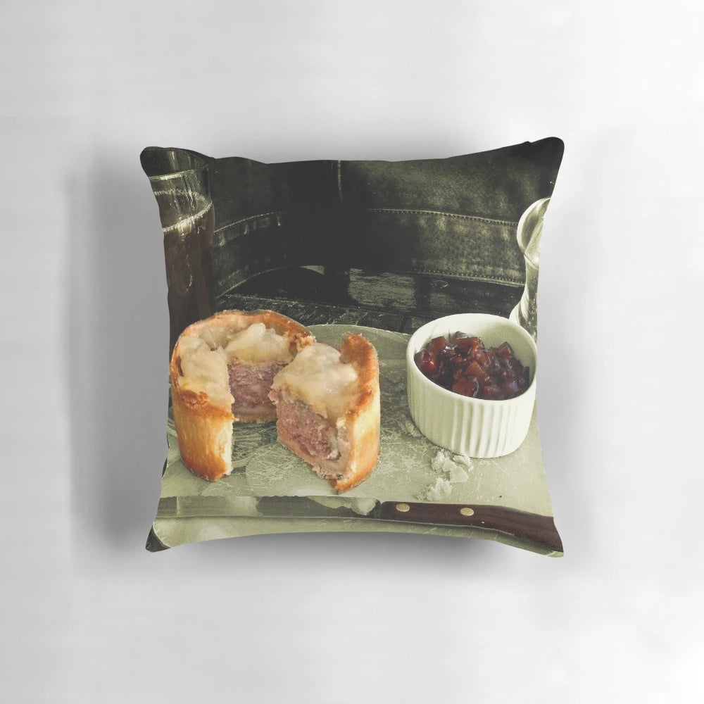 Soft and plush pillow featuring a realistic porky pie design, perfect for food lovers and those seeking comfort during isolation.