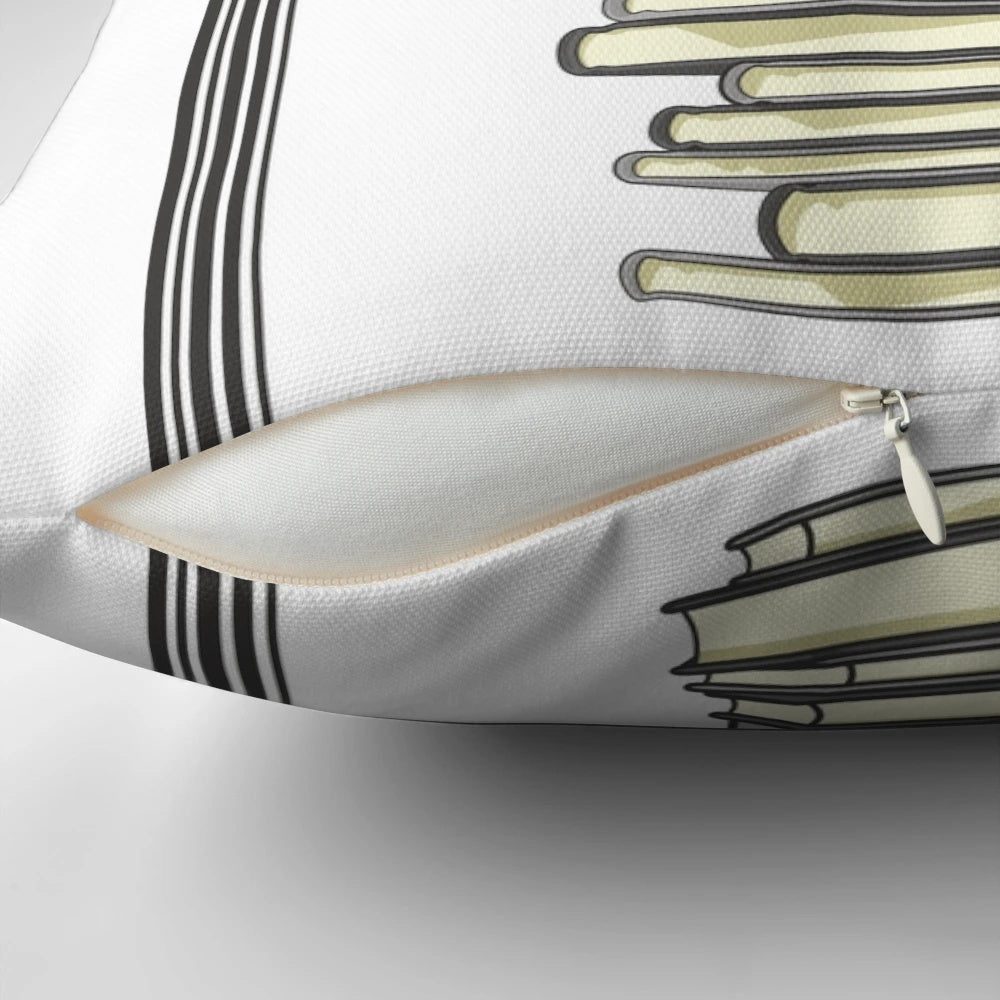 A portable decorative pillow featuring a digital illustration of a stack of books and a book quote.