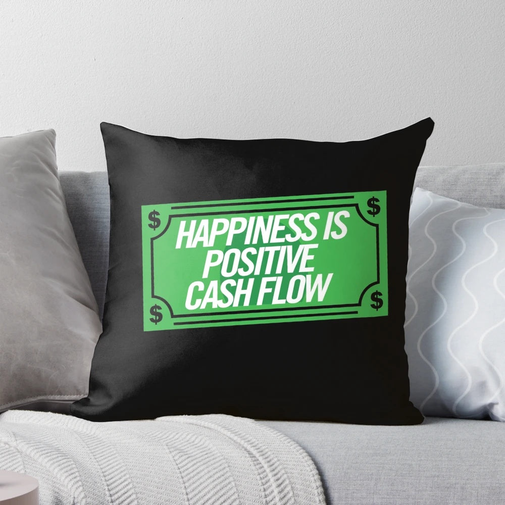 Positive cash flow money quote printed on a decorative throw pillow