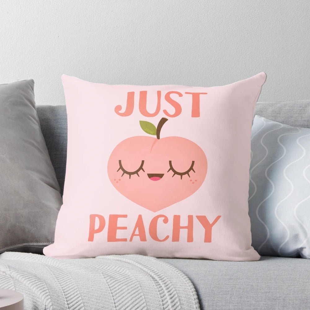 Soft and cozy pillow featuring a cheerful peach illustration, perfect for adding a touch of positivity to any room.