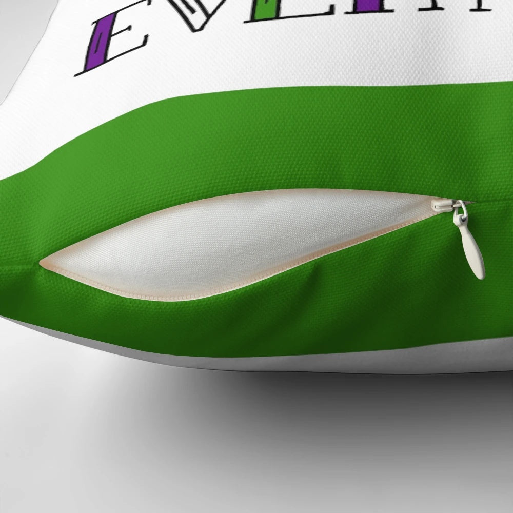 A purple, green, and white pillow featuring the handlettered suffragette quote "Courage Calls to Courage Everywhere" in a bold, inspiring design.