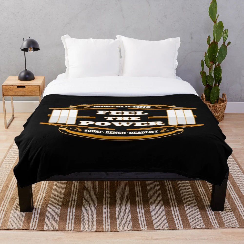 Powerlifting plush blanket with deadlift, squat, and bench press design
