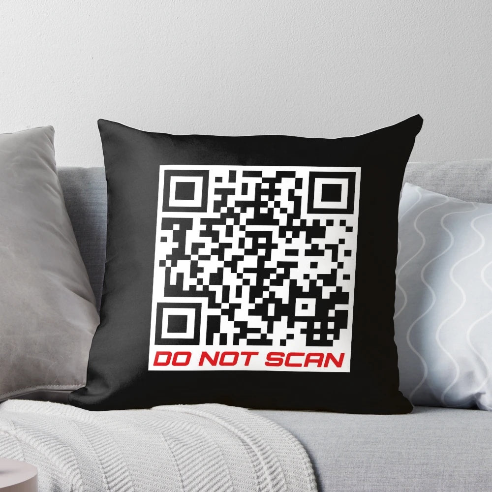 Pillow featuring a QR code that links to the Rick Astley "Never Gonna Give You Up" music video on YouTube