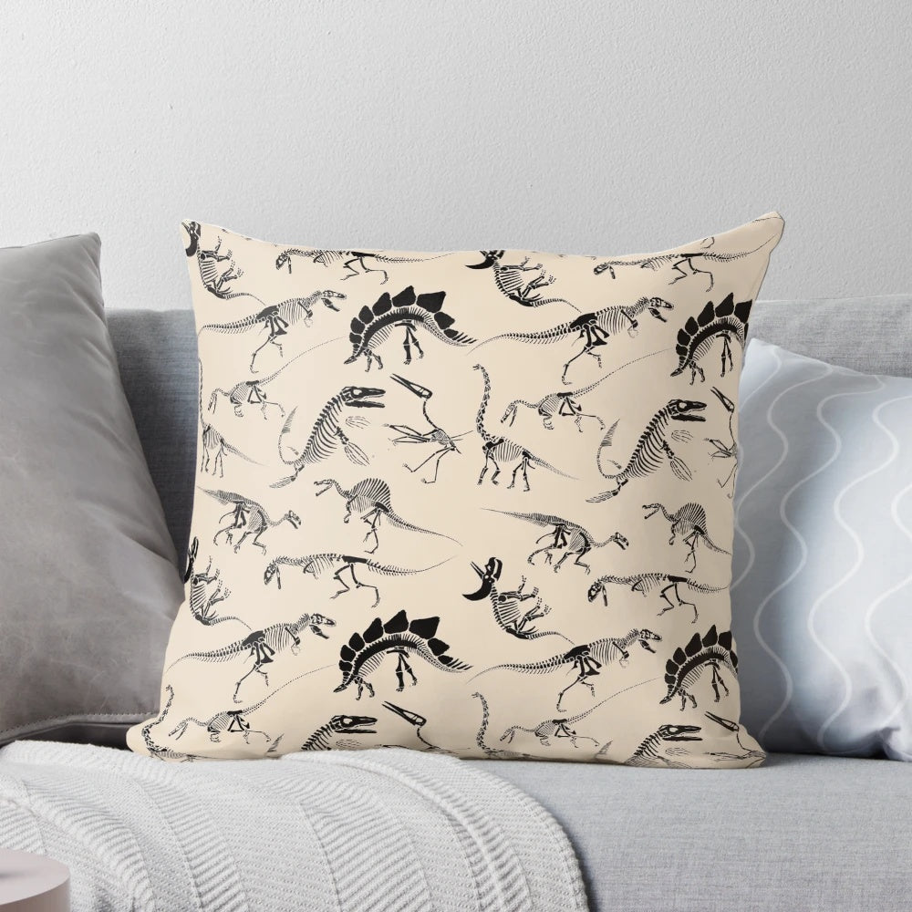 Pillow featuring detailed dinosaur skeleton diagram design