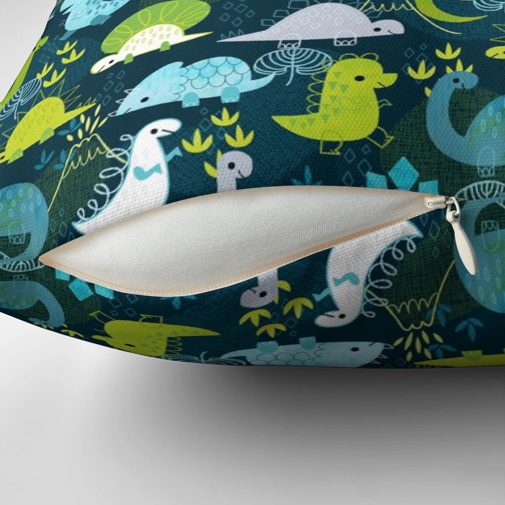 A cozy dinosaur-themed throw pillow featuring a vibrant prehistoric pattern.