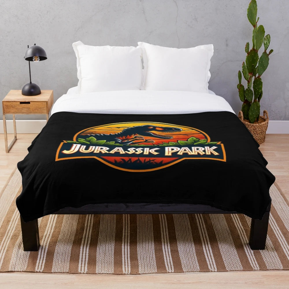 Jurassic Park themed plush blanket with dinosaurs and t-rex