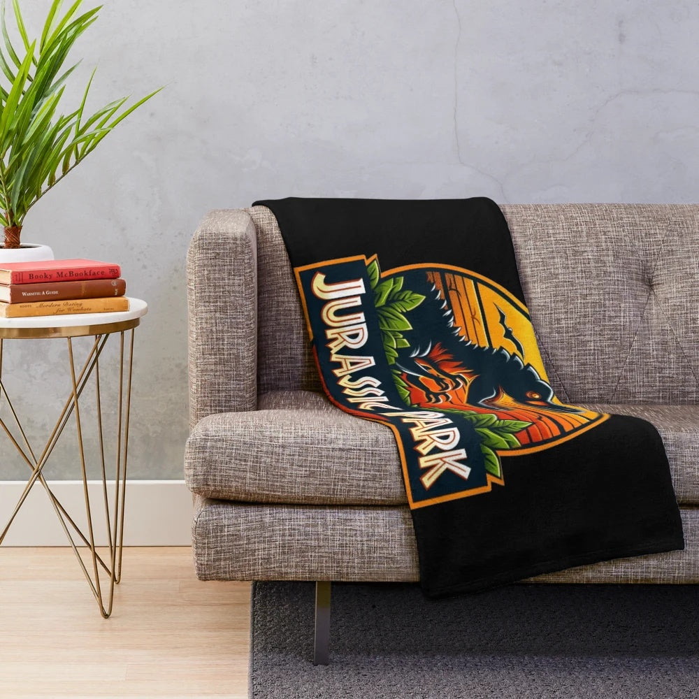Jurassic Park themed plush blanket with dinosaurs and t-rex