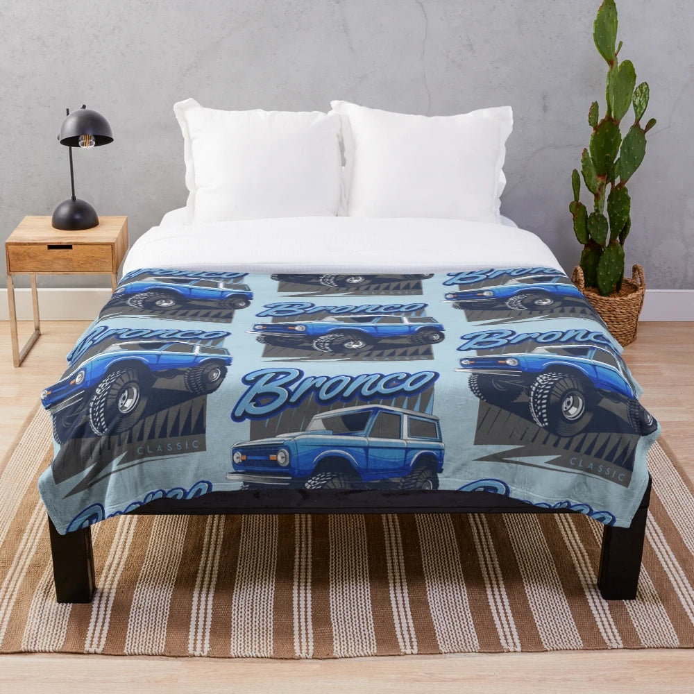 Blue plush blanket featuring a classic Ford Bronco design