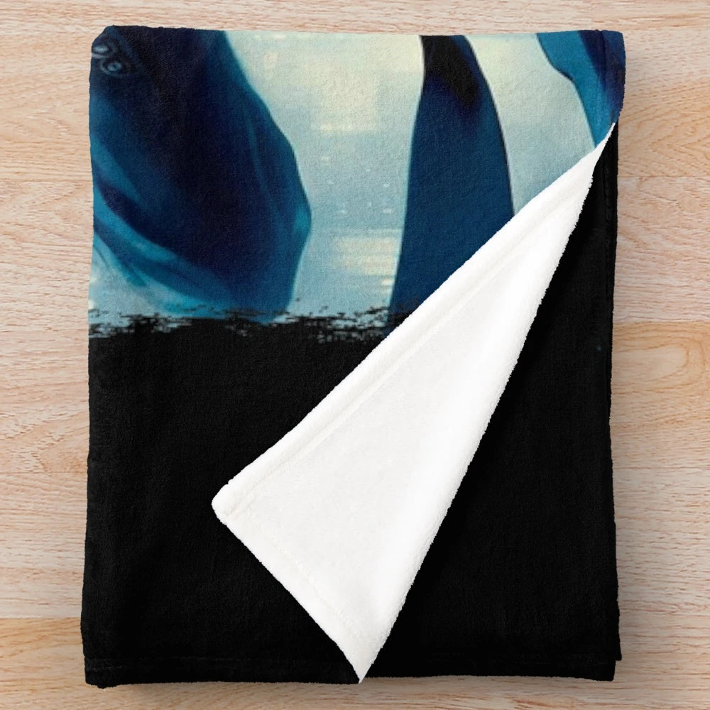 Elegant and plush blanket featuring a mythical black and white floral design
