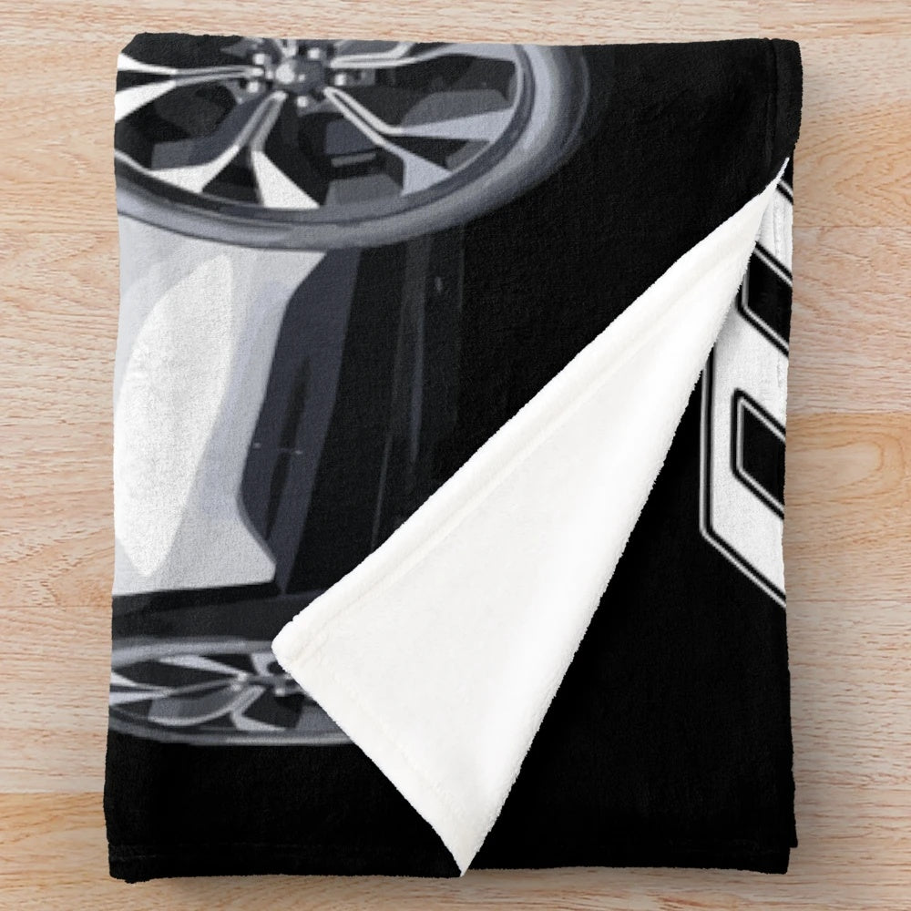 Mustang Mach-E inspired plush blanket with a retro design