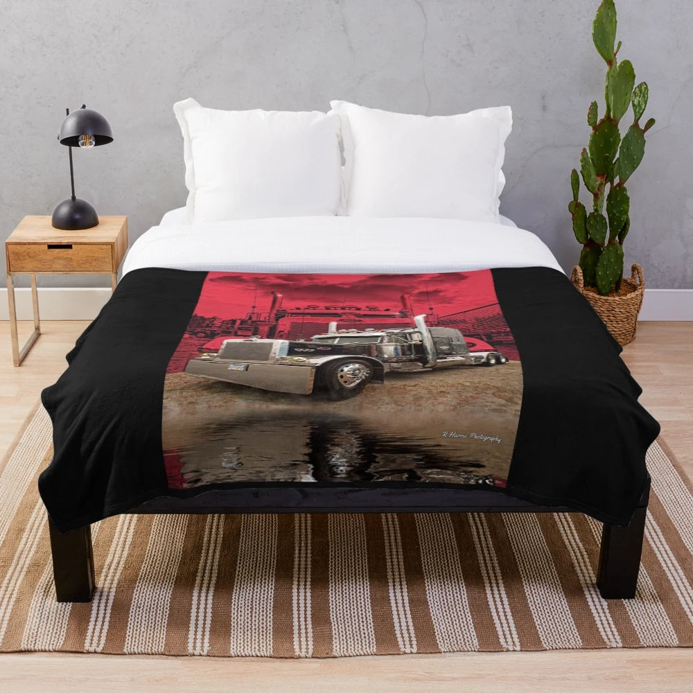 Peterbilt-inspired plush blanket featuring a red background and Peterbilt logo