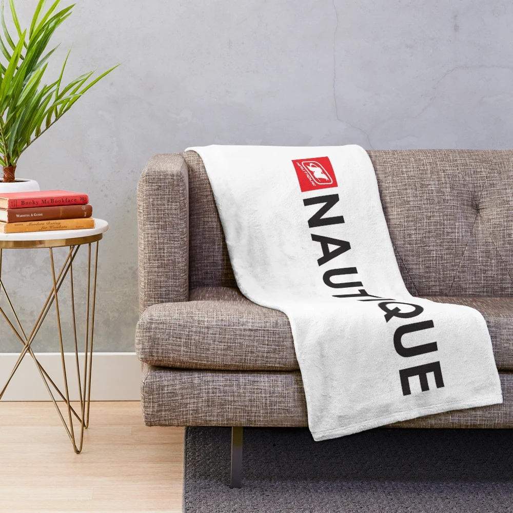 Soft and cozy plush blanket featuring the Nautique boats logo