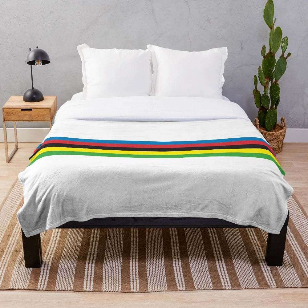 Colorful plush blanket featuring a cycling champion design
