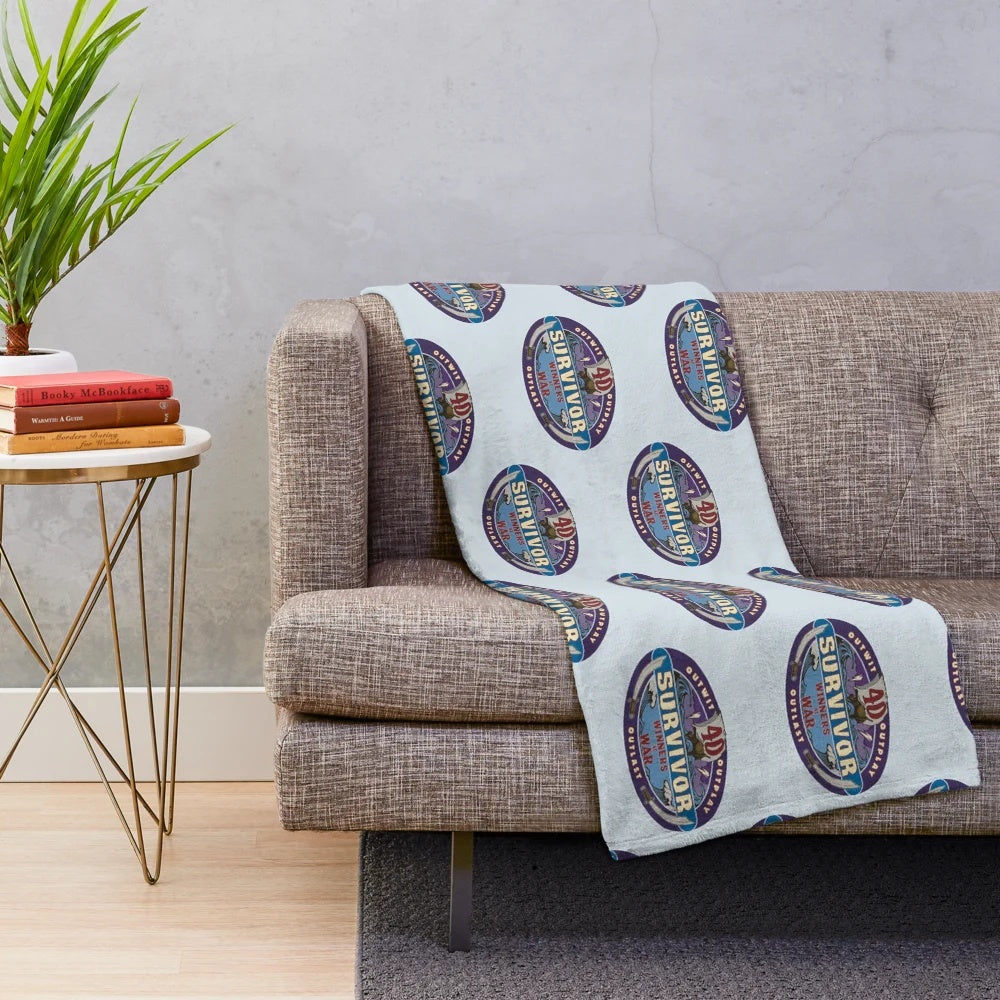 Soft and cozy plush blanket with Survivor-inspired design
