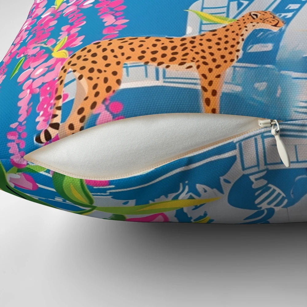 Preppy cheetah print pillow with chinoiserie garden design in shades of cornflower blue and pink