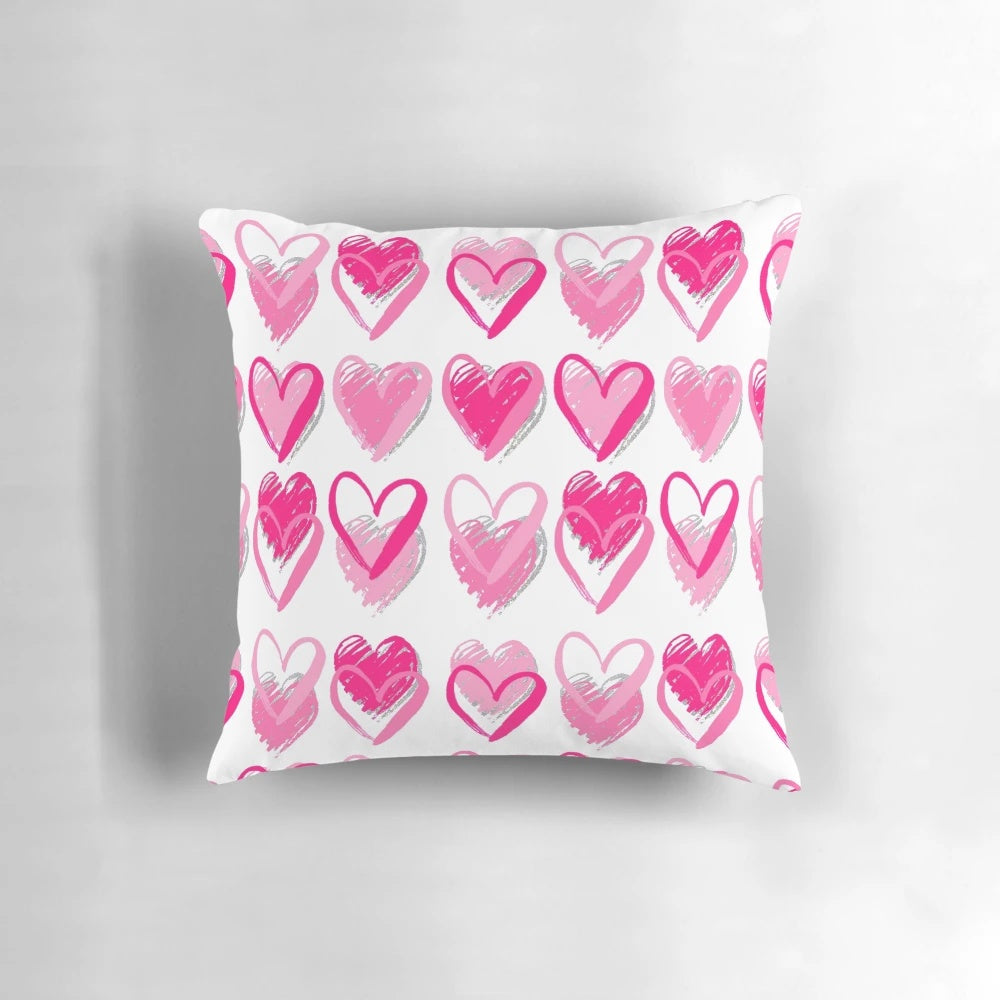Decorative pink hearts pillow with preppy design