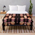 Prince-inspired plush blanket with symmetrical purple and white design
