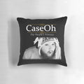 A black and white image of a pillow featuring a parody design of Princess Diana.