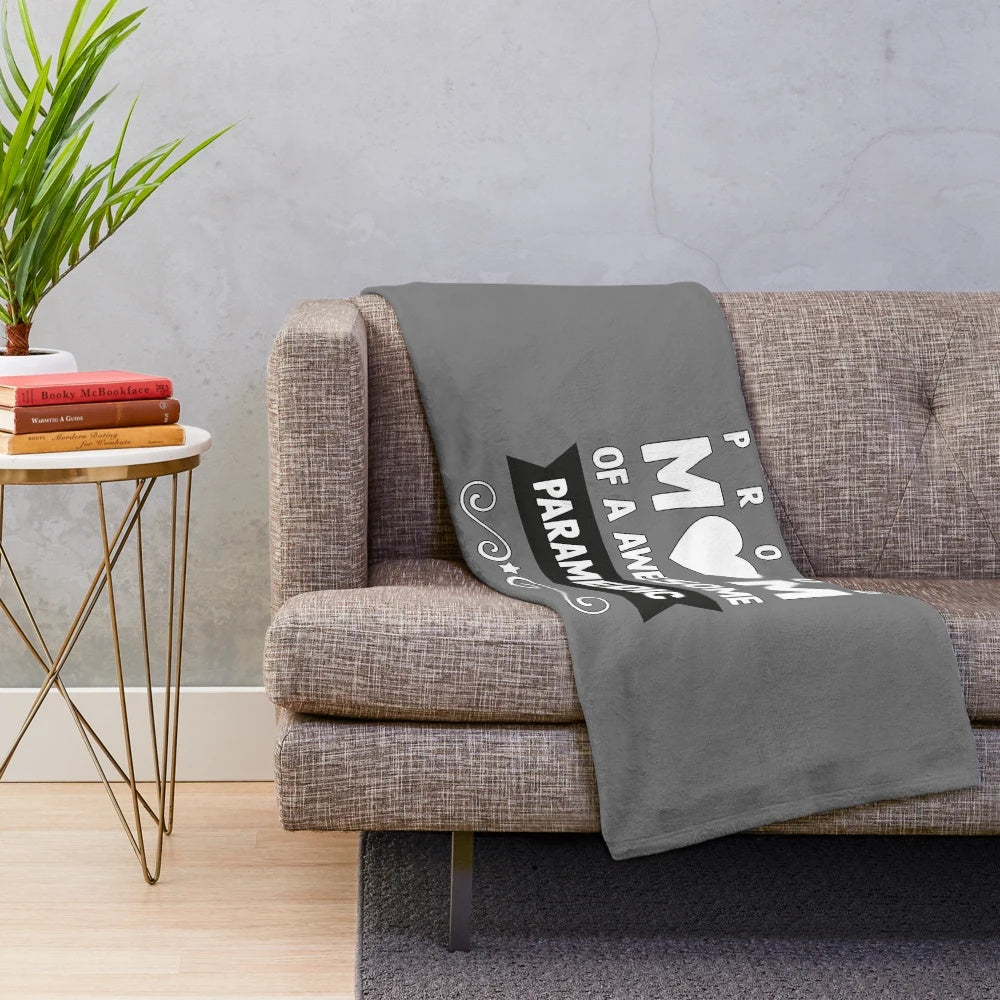 Plush blanket with text "Proud mom of a paramedic