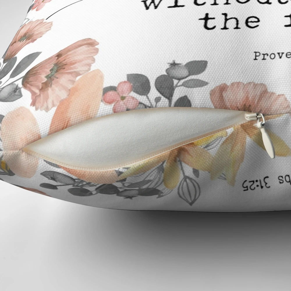 Proverbs 31:25 inspirational pillow with "She is clothed with strength and dignity, and she laughs without fear of the future" bible verse