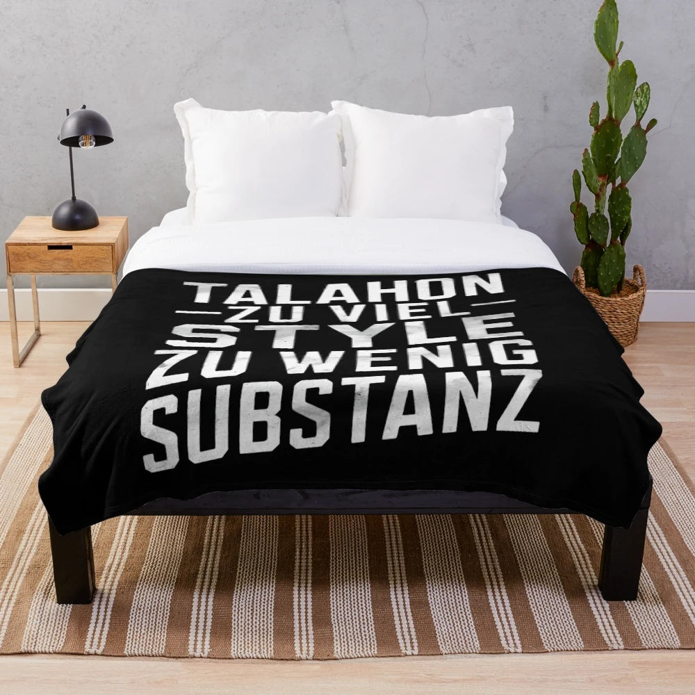 Plush blanket featuring a provocative youth culture statement